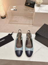 SLINGBACKS LIGHT BLUE MIX BLACK SHEEPSKIN